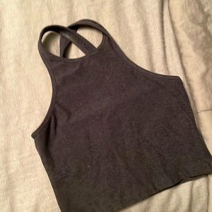 Dark grey yoga top. Size small, great condition. Lined bralette.